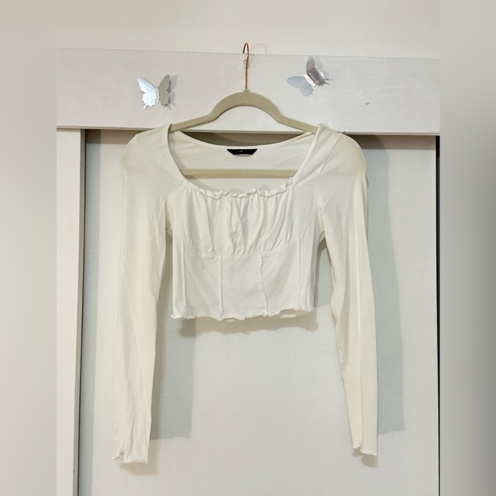 White long sleeve top